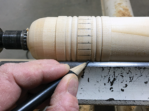 Marking out locations to cut ferrule segments on pencil box