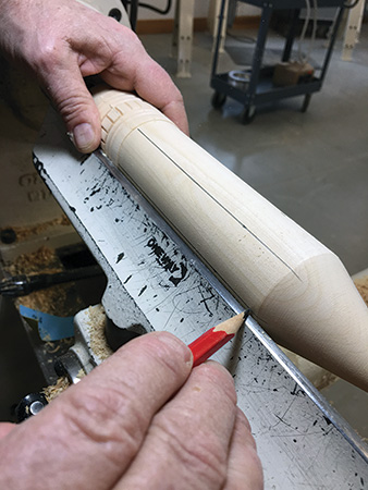 Marking flat side segments of pencil box body
