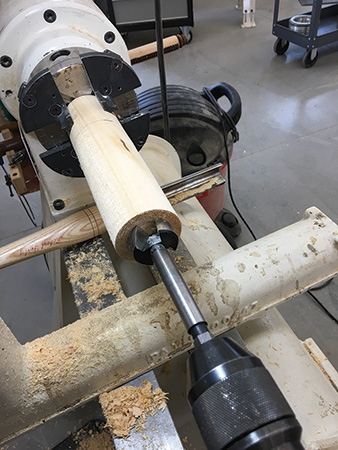 Mounting pencil box in lathe with drill chuck