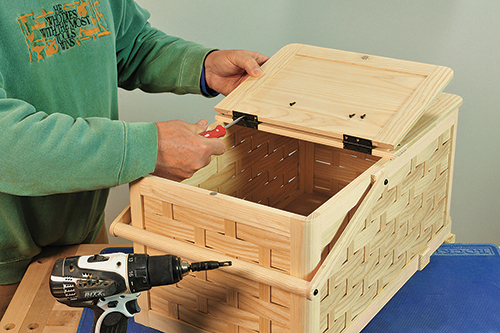Attaching hinges to picnic basket lid center