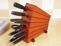 Knife block with alternating wood stripes