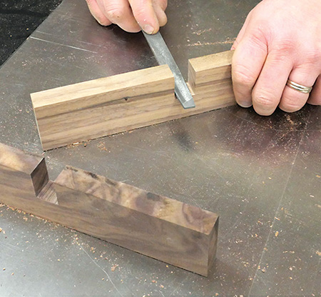 Cleaning up plant stand joinery cut with a file