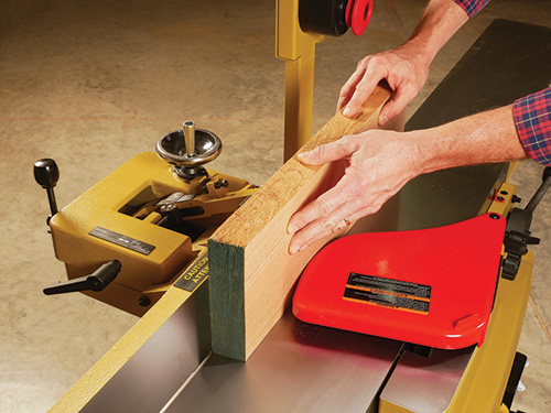 Flattening edge of board on jointer cutterhead