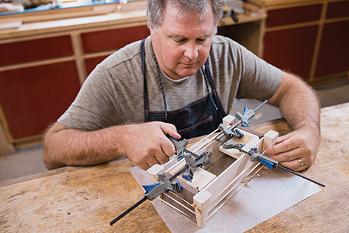 Using rubber bands as makeshift workshop clamps