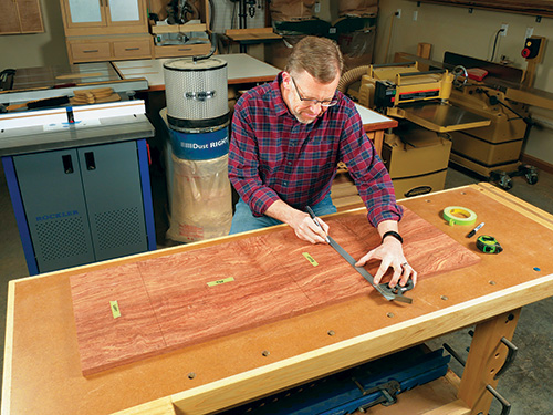 Marking cut lines for printer stand on wood panel