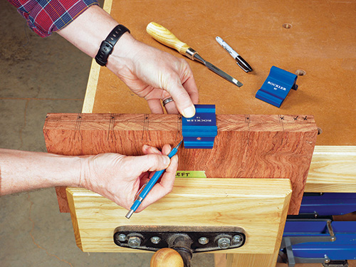 Marking out dovetail joinery on printer stand with saddle squares