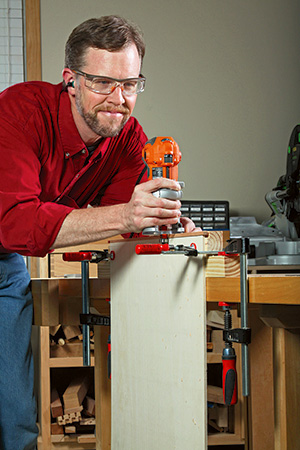 Trimming edge of puzzle board with router