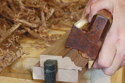 Cutting crown molding for Queen Anne highboy with plane