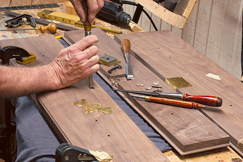 Cutting mortises for lock in Queen Anne Highboy drawer faces with chisel