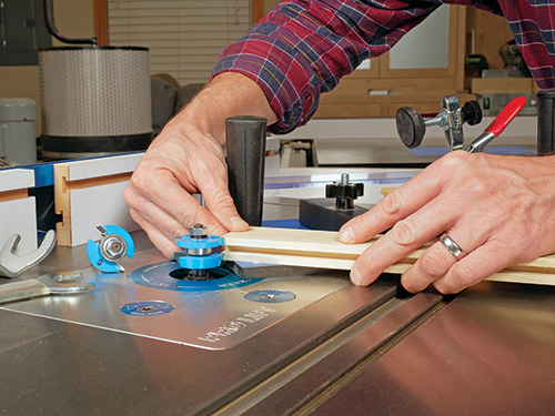 Checking router bit against cut on rail-and-stile joint