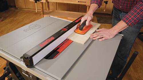Cutting cabinet drawer face groove on a table saw