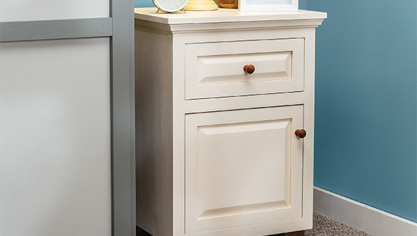 Small side cabinet with frame and panel doors