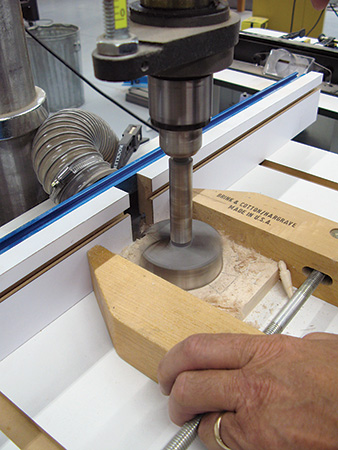 Clamping the clock face on drill press for drilling