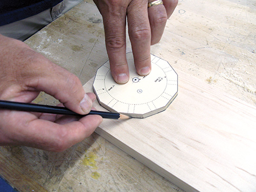 Tracing out clock face shape on stock
