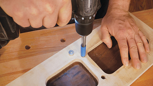 Adding magnet holes for a reversible gameboard