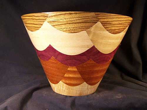 Side view of exotic wood bowl made with Ring Master