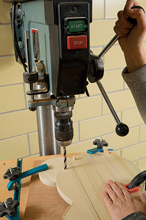 Drilling dowel holes for mirror shelf