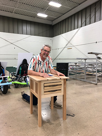 Rob with student's side table