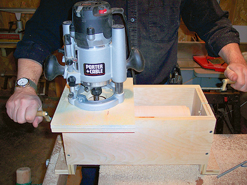 Router set up in in slide over rolling pin jig