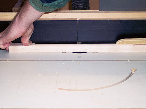 Cutting stock into a handle with a roundover router bit