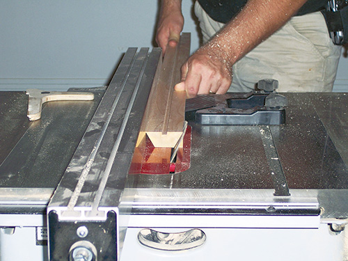 Cutting out core of rolling pin at a table saw