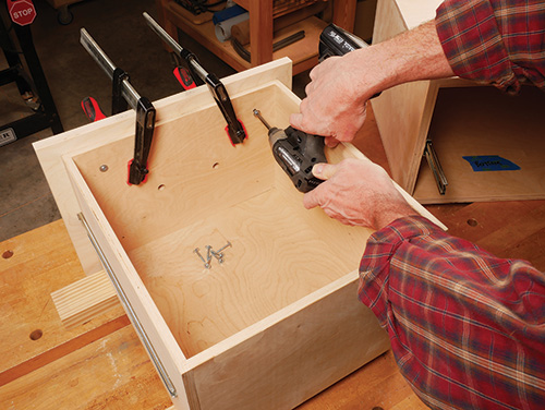 Driving washerhead screws in router table cabinet drawer