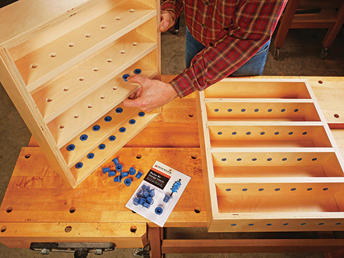 Router bit storage inserts in router cabinet shelving