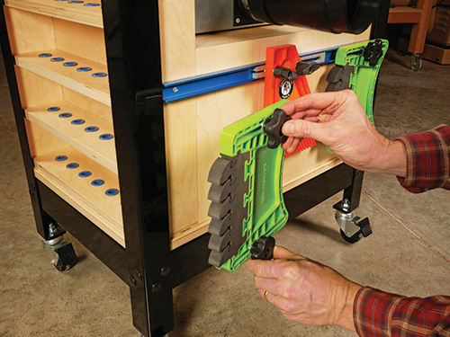 Storing tools on a router table cabinet