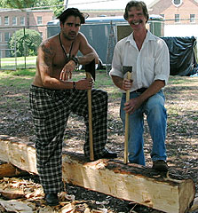 Roy, right, teaches actor Colin Farrell how to hew wood.