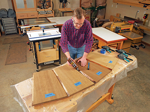 Applying hide glue on Roycroft taboret table base panels