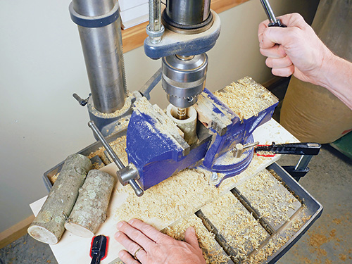 Drilling out candle holder hole with drill press