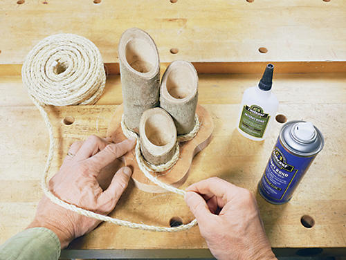 Wrapping candle holders with decorative rope accent