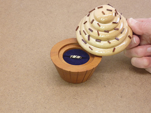 Engagement ring box cut to look like a cupcake