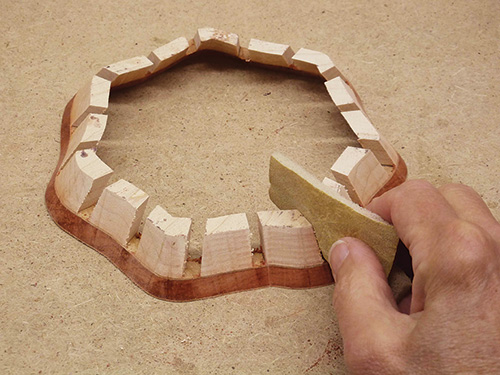 Sanding bowl segments with a small sanding block
