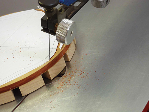 Cutting segmented bowl rim with scroll saw