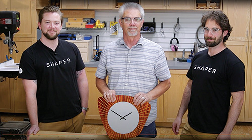 Rob Johnstone stands with Russ Fogel and Jake Stilwell from Shaper Tools
