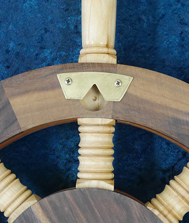 Wall mounting notch in back of ship wheel clock