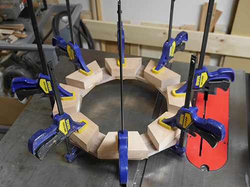 Clamping up center blank of ship wheel clock