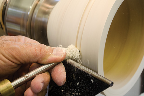 Moving tool across the bowl to create curved bead