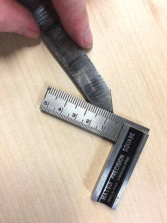 Measuring blade flatness with a square