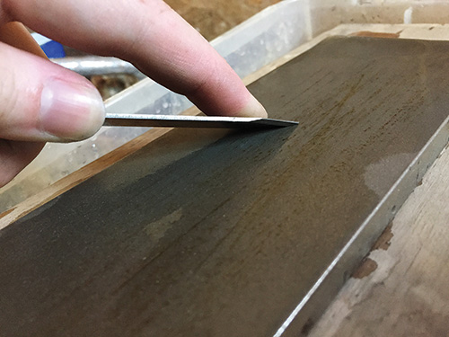 Removing burr after sharpening blade on diamond stone with an oil or waterstone