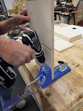 Cutting holes for bookcase kick plate with pocket hole jig