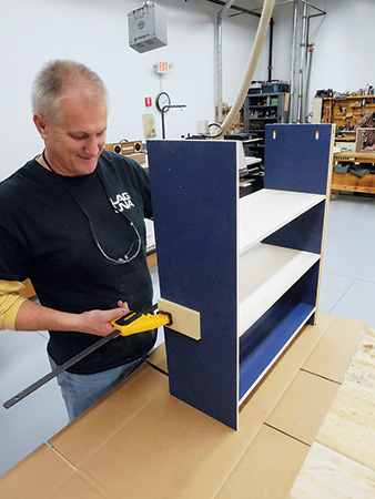 Clamping bookcase parts together with padding