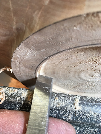 Using skew chisel to create lip in bowl foot interior