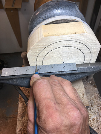 Marking out wood blank to create a mounting block