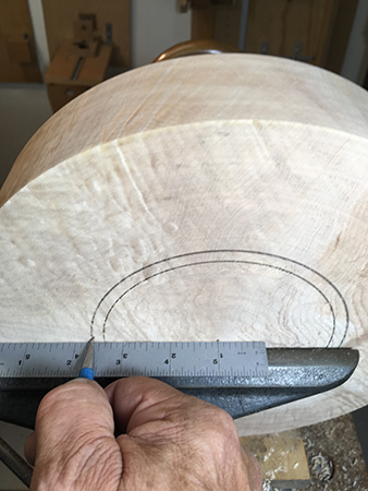 Marking bowl foot on center of blank