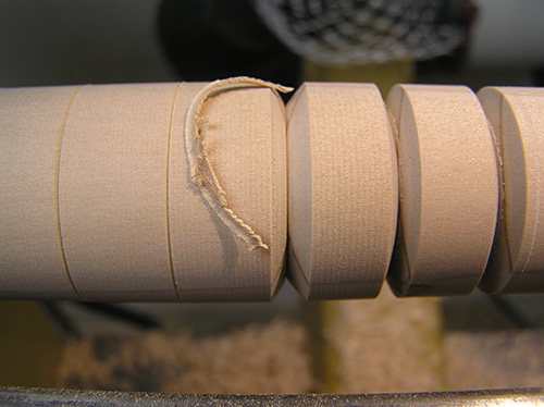 Close-up view of a completed v-groove cut