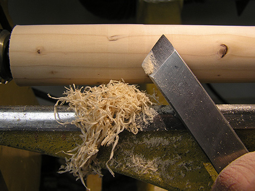 Using skew chisel to plane a turning blank