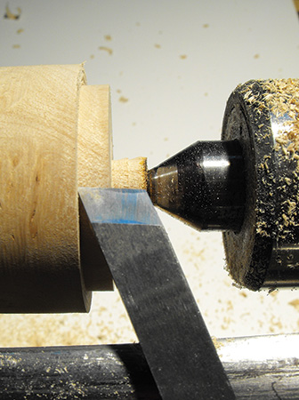 Making peeling cut with skew chisel