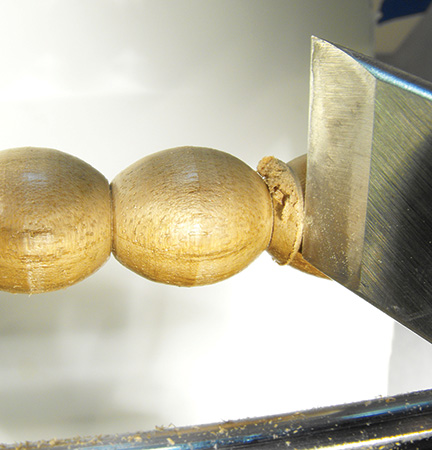 Forming beads by cutting with heel of skew chisel